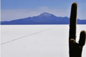  ?? Photograph: Aizar Raldes/AFP/Getty Images ?? Bolivia’s Uyuni salt flat. The lithium found in the seemingly endless salt desert is a key component of batteries used in electric cars.