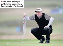  ??  ?? > Phil Price lines up a putt during yesterday’s final round at Porthcawl