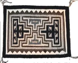  ??  ?? 5. Classic Storm Pattern, weaver unknown, 1980s. 6. A small Two Grey
Hills weaving, weaver unknown.
7. Bruce and Virginia Burnham with a Bisti style rug honoring the R.B. Burnham Trading Post, originally in Kirtland,
New Mexico.