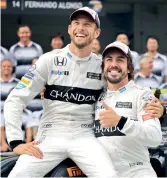  ?? — AP ?? Jenson Button (left) and Fernando Alonso.