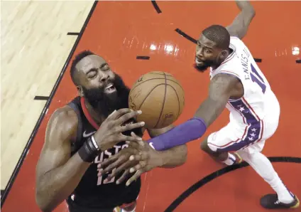  ?? AP FOTO ?? FOUL. James Harden loses the ball after getting fouled by James Ennis III.
