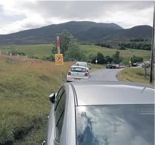  ?? Picture: Andy Ferguson. ?? Tourists snapped ignoring signs near Schiehalli­on.