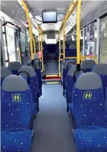  ?? Supplied photos ?? Mattar Al Tayer is briefed on the newly introduced VDl bus, and right, an inside view of the 45-seat bus. —