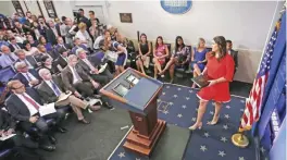  ?? — AP ?? WASHINGTON: Sarah Huckabee Sanders who has been named White House press secretary walks to the podium during the press briefing in the Brady Press Briefing room of the White House.