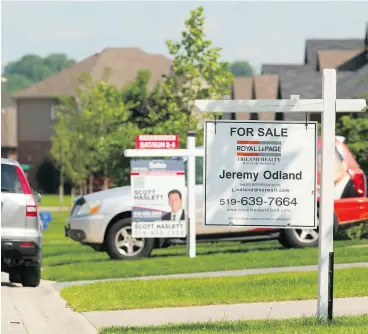  ?? MIKE HENSEN / POSTMEDIA NEWS FILES ?? Second or third mortgages on homes are subject to default, leaving investors exposed.