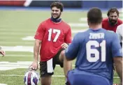  ?? JAMES P. MCCOY AP ?? Buffalo went all in to draft quarterbac­k Josh Allen (17), and the Dolphins hope Tua Tagovailoa is their franchise QB.