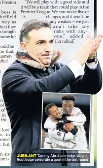  ??  ?? JUBILANT Tammy Abraham helps Wayne Routledge celebrate a goal in the last round