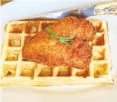  ??  ?? For a protein-filled breakfast treat, try the waffles and chicken.