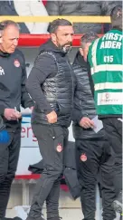  ??  ?? Derek McInnes watches on