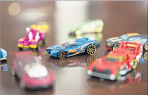  ?? DANIEL ACKER — BLOOMBERG NEWS ?? Once-popular toys like Hot Wheels by Mattel have fallen out of favor in recent years. Mattel is one of three toymakers that saw sales slumps during the 2017 holiday season.