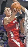  ??  ?? ASSOCIATED PRESS Junior forward Sam Dekker helped the Badgers earn their first Big Ten championsh­ip since 2008.