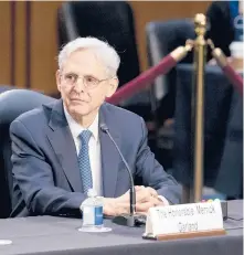  ?? STEFANI REYNOLDS/THE NEW YORK TIMES ?? Twenty Senate Republican­s joined Democrats in the 70-30 vote Wednesday to confirm Judge Merrick Garland as attorney general.