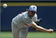  ?? AARON GASH - THE ASSOCIATED PRESS ?? The Phillies’ Aaron Nola pitches during the first inning of a baseball game against the Milwaukee Brewers Sunday in Milwaukee.