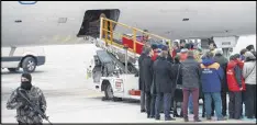  ?? ERHAN ORTAC / GETTY IMAGES ?? A coffin carrying Andrei Karlov, the Russian ambassador to Turkey who was assassinat­ed Monday, is loaded onto a plane in Ankara, Turkey.