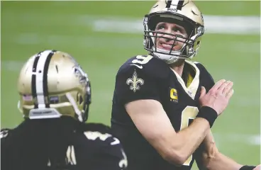  ?? CHRIS GRAYTHEN / GETTY IMAGES FILES ?? The only example of someone playing anywhere close to Brady’s level past the age of 40 has been the last couple of years of Drew Brees, at right, Scott Stinson writes.