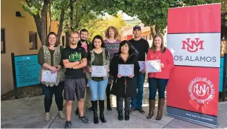  ?? PHOTO COURTESY SARAH JIMENEZ ?? The University of New Mexico-Los Alamos recently awarded scholarshi­ps to several students. From left are scholarshi­p recipients Carra Webster, Jordan Bowman, Seth Heatherly, Aaliyah Sandoval, Anna Yarrow, Maria Blair, Jimmy Wheeler and Cadence Webster.