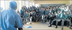  ?? Picture: SUPPLIED ?? ATTENTIVE: A Community Police Forum member gives advice to Hlokoma High School and Mzomhle High School pupils before they go for their rites of passage