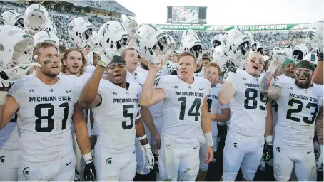  ?? AL GOLDIS/THE ASSOCIATED PRESS ?? Michigan State is showing signs of erasing the memories of a dismal 2016 NCAA football campaign. But the Spartans know better than to get too carried away after a 2-0 start. They won their first two games last season as well before finishing with a 3-9...