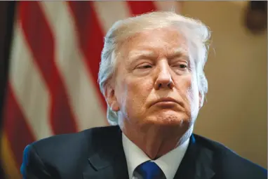  ?? Associated Press photo ?? President Donald Trump listens during a meeting with lawmakers on immigratio­n policy in the Cabinet Room of the White House in Washington earlier this week. Trump used profane language as he questioned Thursday why the U.S. should permit immigrants...