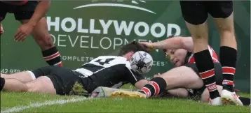  ??  ?? CLOSE: Derek Williams just fails to score this try for Dundalk against Wicklow.