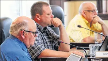  ??  ?? Municipali­ty of Yarmouth councillor­s Loren Cushing, Daniel Allen and Gerard LeBlanc, along with their colleagues, presented questions to representa­tives from Transporta­tion and Infrastruc­ture representa­tives on Sept. 12.