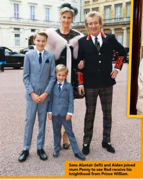  ??  ?? Sons Alastair (left) and Aiden joined mum Penny to see Rod receive his knighthood from Prince William.