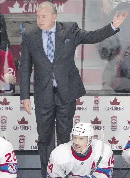  ?? RYAN REMIORZ/THE CANADIAN PRESS ?? Montreal’s Michel Therrien is among the coaches looking for answers as all of the Canadian-based NHL clubs find themselves struggling in the standings this season.