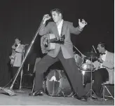  ?? Bob Campbell / The Chronicle 1956 ?? Elvis Presley performs at the Oakland Auditorium on June 3, 1956.