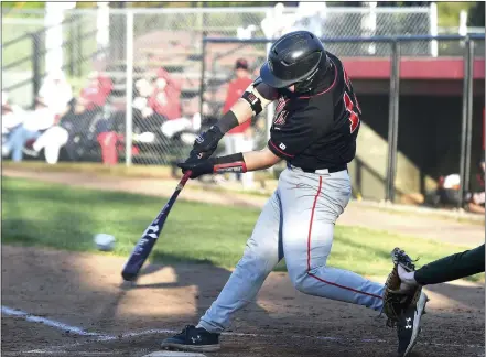  ?? PETE BANNAN — MEDIANEWS GROUP ?? Coatesvill­e’s (17) RJ RIckabaugh knocks in a run in the first inning as the Red Raiders rolled over Bishop Shanahan at home Monday evening.