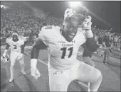  ?? MICHAEL SHROYER | GETTY IMAGES ?? DEFENSIVE TACKLE Miles Fox of the Old Dominion Monarchs celebrates the victory against the Virginia Tech Hokies on Saturday in Norfolk, Va.