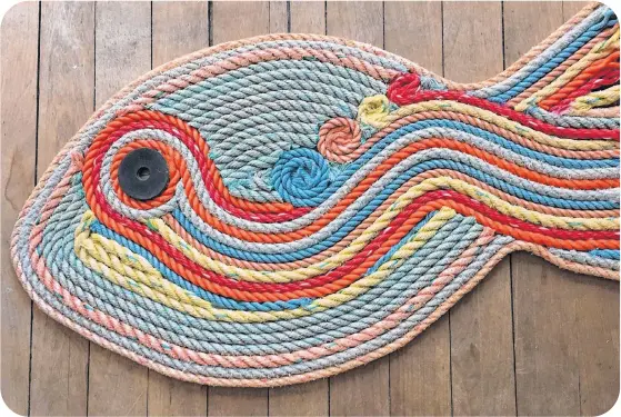  ??  ?? These fish mats, made of reclaimed fishing rope, are among the most popular products made by Nicole Poirier and Tanya Holt, the creators of Art Marée Haute.