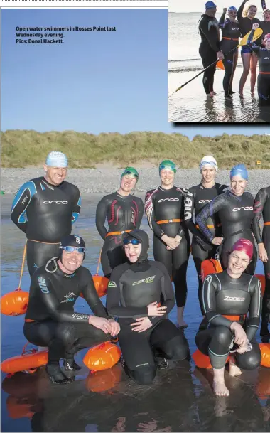  ??  ?? Open water swimmers in Rosses Point last Wednesday evening. Pics: Donal Hackett.