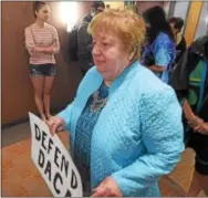  ??  ?? Phyllis Fields of Drexel Hillwas among the protesters at U. S. Rep. Patrick Meehan’s office in Springfiel­dWednesday to voice their unhappines­s over President Donald Trump’s decision to end DACA - Deferred Action for Childhood Arrivals. “I feel so bad...