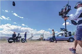  ?? JEFF NEUMANN/FOX ?? From left, Adan Canto, Élodie Yung and Oliver Hudson behind the scenes in the “The Cleaning Lady.”