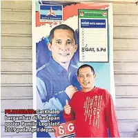  ??  ?? PILIHAN RAYA: Gat Khaleb bergambar di hadapan poster Pemilu Legislatif 2019 pada April depan.