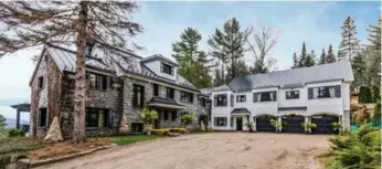  ?? ALEXANDRE PARENT PHOTOS/STUDIO POINT/SOTHEBY’S INTERNATIO­NAL REALTY QUEBEC ?? The original stone house, built in the 1930s, was doubled in size with additional wings and a fourth floor.