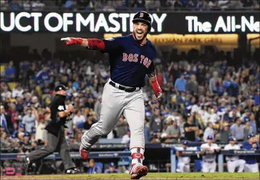  ?? WALLY SKALIJ / LOS ANGELES TIMES ?? World Series MVP Steve Pearce celebrates his second home run of Sunday’s game against the Dodgers. Pearce had three homers and seven RBIs in the final two games.