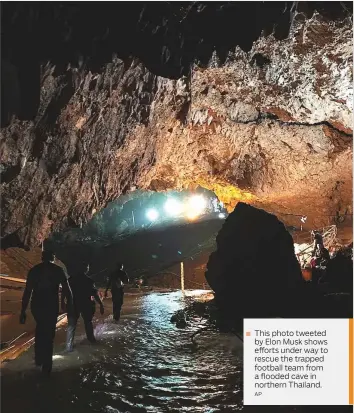  ?? AP ?? This photo tweeted by Elon Musk shows efforts under way to rescue the trapped football team from a flooded cave in northern Thailand.