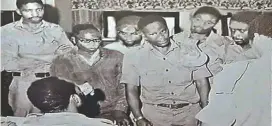  ?? ?? President Samora Machel of Mozambique (back to camera on the left) speaks to Zipa commanders from left Cdes Phelekezel­a Report Mphoko, Elias Hondo in glasses, the third is unidentifi­ed, the fourth being Rex Nhongo (General Solomon Mujuru) the fifth is John Dube (Sotsha Ngwenya) while far right is Alfred Nikita (Rogers Mangena). Picture supplied by Cde Irvine Khulekani Sibhona