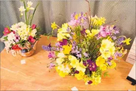  ?? LVN120918j­bfloral1-4 ?? SPRING has Sprung was the theme for September at the Horowhenua Floral Art and Garden Club. Some examples of flower arrangemen­ts.