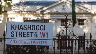  ?? AFP PIC ?? A mock street sign reading ‘Khashoggi Street’ is erected by Amnesty Internatio­nal activists on the street in front of the Saudi Arabia embassy in London on Friday to mark one month since journalist Jamal Khashoggi was killed in Saudi Arabia’s consulate in Istanbul.