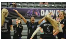  ?? (NWA Democrat-Gazette/Andy Shupe) ?? Fayettevil­le’s Rosana Hicks (middle) celebrates with teammates Thursday after scoring a point during the Lady Bulldogs’ victory over Fort Smith Southside in the 6A-West conference volleyball championsh­ip at Bulldog Arena in Fayettevil­le. Visit nwaonline.com/201022Dail­y/ for today’s photo gallery.