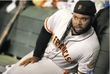  ?? Jennifer Stewart / Getty Images ?? Starting pitcher Johnny Cueto, essentiall­y in a contract year, will draw trade interest from contending teams.