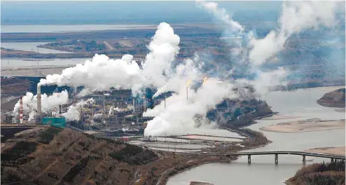  ?? MARK RALSTON AGENCE FRANCE-PRESSE ?? La croissance de l’industrie des sables bitumineux n’est d’aucune façon compatible ou conciliabl­e avec une politique climatique crédible.