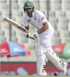  ?? — AFP ?? Bangladesh’s Mahmudulla­h Riyad plays a shot during the second day of the second Test against West Indies in Dhaka.