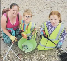  ??  ?? DOING THEIR BIT Dani Allen from Havant, with her children Jack and Zoe