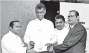  ??  ?? From left: Isura Devapriya, the Chief Minister of the Western Province , Patalicham­pikav Ranawaka, Minister of Megapolis and Western Developmen­t , Lasantha Alagiyawan­na, Deputy Minister of Megapolis and Western Developmen­t and Hemaka De Alwis, Chairman, Fairway Holdings