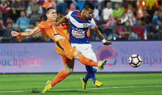  ??  ?? By K. RAJAN Tough luck: Norshahrul Idlan Talaha (left) is one of Felda United’s key players who is doubtful for the Super League match against Perak tonight. — Bernama