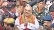  ?? MOHD ZAKIR/HT PHOTO ?? BJP president Amit Shah celebrates with supporters at the party headquarte­rs in New Delhi on Saturday.