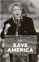  ?? Jacquelyn Martin / Associated Press ?? Indicted Attorney General Ken Paxton speaks at the “Save America Rally” on Jan. 6. His office hasn’t released the full cost of his lawsuit to subvert the presidenti­al election, which would have ruined America.